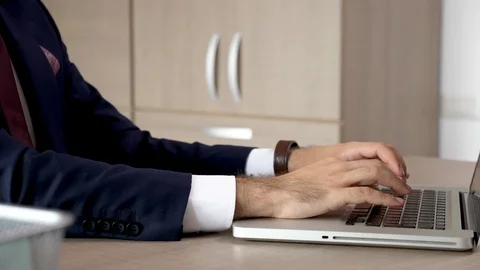 Businessman hands in close up typing on computer keyboard Stock Footage 93601533