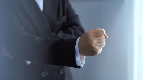 Businessman hands gesture while celebrating company success Stock Footage 121298697