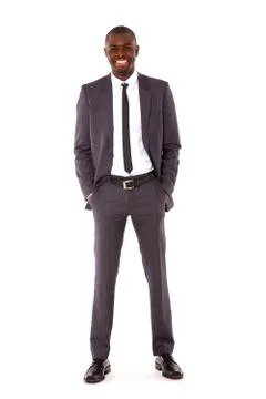 Businessman with hands in pocket Stock Photos