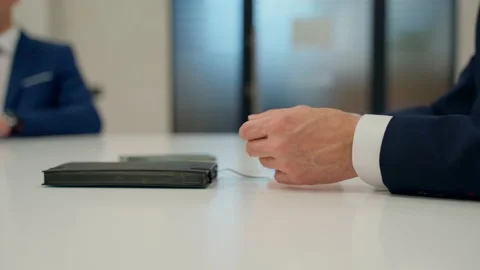 Businessman hands on table close up. Unrecognizable person in suit Stock Footage 162679233
