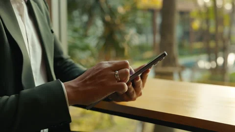 Businessman hands tap tablet computer screen at wooden counter in office Stock Footage 305412070
