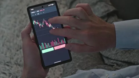 Businessman Hands Touching Screen with Trading Charts and Candlestick Data Stock Footage 341568886