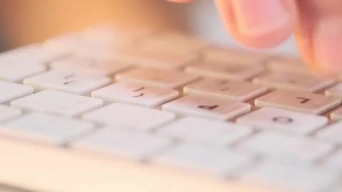 Businessman hands typing on a keyboard, preparing a financial report. Stock Footage 294162887