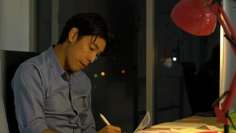 Businessman hard working with desktop computer to late night at office. 스톡 동영상 109243642