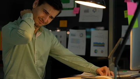 Businessman hard working with desktop computer to late night at office. Stock Footage 111639732