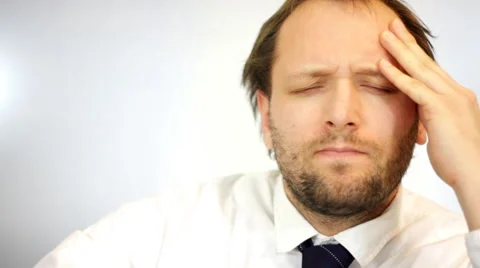 Businessman having headache Stock Footage 981846