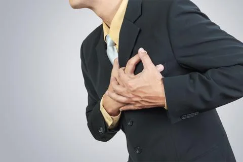 Businessman having heart attack Stock-Fotos