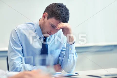 Businessman having problem in office Stock Photos