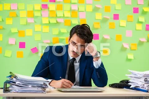 Businessman having trouble with his priorities Stock Photos