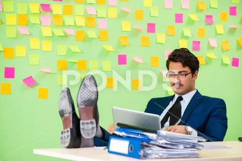 Businessman having trouble with his priorities Stock Photos
