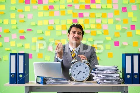 Businessman having trouble with his priorities Stock Photos