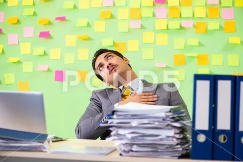 Businessman having trouble with his priorities Stock Photos