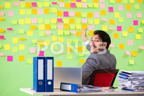 Businessman having trouble with his priorities Stock Photos