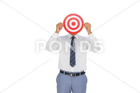 Businessman hiding his face behind a red target Stock Photos