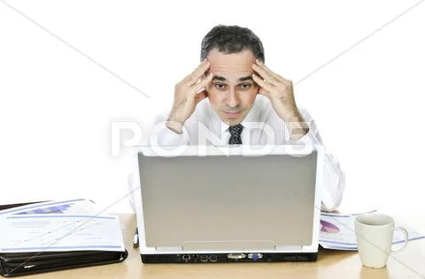 Businessman at his desk on white background Stock Photos