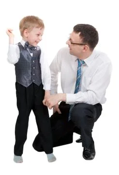 Businessman with his son in the studio Stock Photos