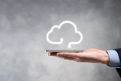 Businessman hold cloud icon.Cloud computing concept - connect smart phone to  Foto stock