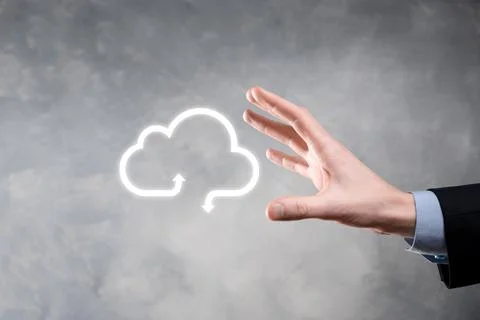 Businessman hold cloud icon.Cloud computing concept - connect smart phone to  Foto stock