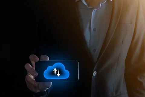 Businessman hold cloud icon.Cloud computing concept - connect smart phone to  Foto stock