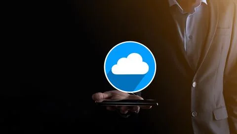 Businessman hold cloud icon.Cloud computing concept - connect smart phone to  스톡 사진