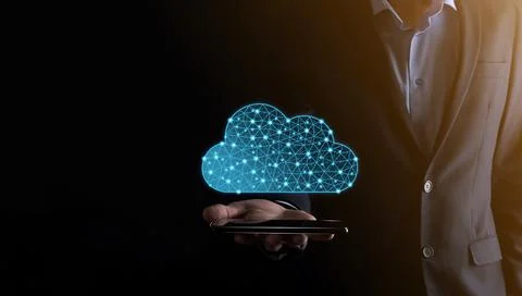 Businessman hold cloud icon.Cloud computing concept - connect smart phone to  Foto stock