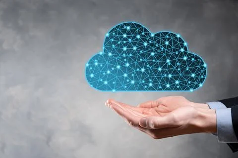 Businessman hold cloud icon.Cloud computing concept - connect smart phone to  Stock Photos