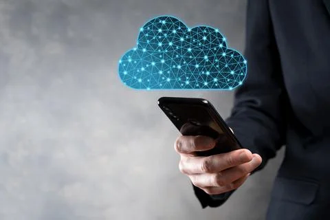 Businessman hold cloud icon.Cloud computing concept - connect smart phone to  스톡 사진