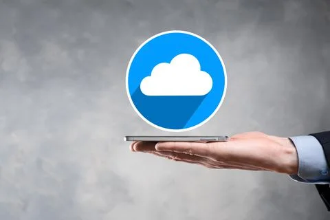 Businessman hold cloud icon.Cloud computing concept - connect smart phone to  Stock Photos