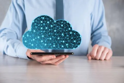 Businessman hold cloud icon.Cloud computing concept - connect smart phone to  스톡 사진