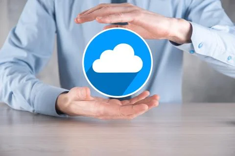 Businessman hold cloud icon.Cloud computing concept - connect smart phone to  스톡 사진