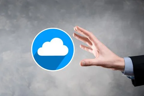 Businessman hold cloud icon.Cloud computing concept - connect smart phone to  Stockfoto's