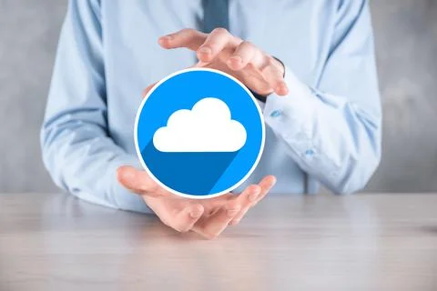 Businessman hold cloud icon.Cloud computing concept - connect smart phone to  Foto stock