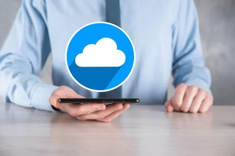Businessman hold cloud icon.Cloud computing concept - connect smart phone to  Foto stock