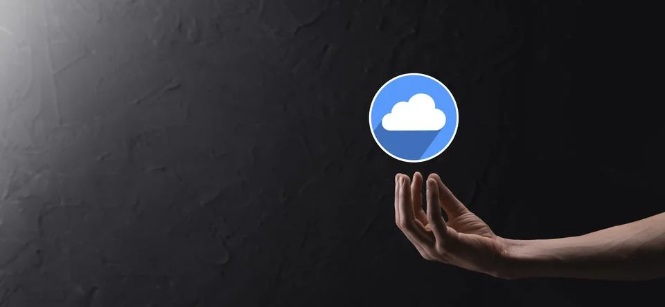 Businessman hold cloud icon.Cloud computing concept - connect smart phone to  Stock Photos