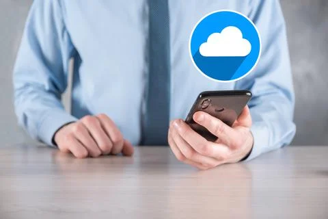 Businessman hold cloud icon.Cloud computing concept - connect smart phone to  Foto stock