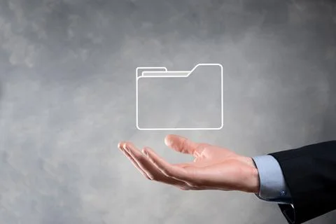 Businessman hold folder icon.Document Management System or DMS setup by IT co 写真素材