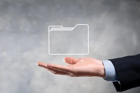 Businessman hold folder icon.Document Management System or DMS setup by IT co 写真素材