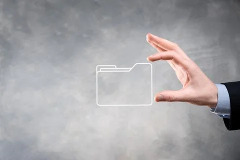 Businessman hold folder icon.Document Management System or DMS setup by IT co Stockfoto's