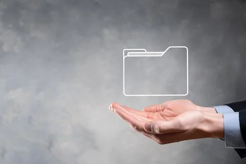 Businessman hold folder icon.Document Management System or DMS setup by IT co Stockfoto's