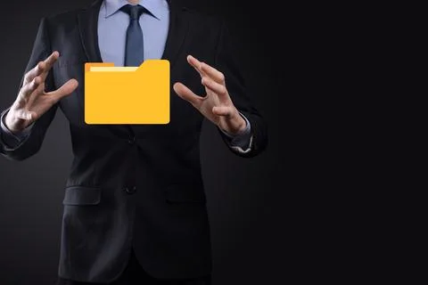 Businessman hold folder icon.Document Management System or DMS setup by IT co 写真素材