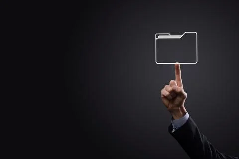 Businessman hold folder icon.Document Management System or DMS setup by IT co Stockfoto's