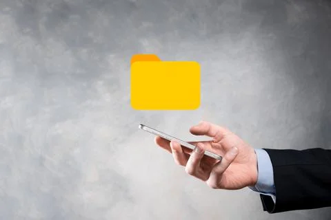 Businessman hold folder icon.Document Management System or DMS setup by IT co Stockfoto's