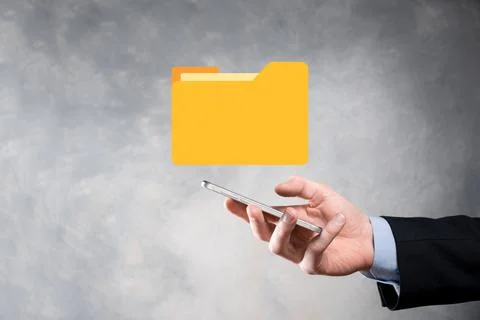 Businessman hold folder icon.Document Management System or DMS setup by IT co 写真素材