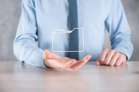 Businessman hold folder icon.Document Management System or DMS setup by IT co Stock Photos