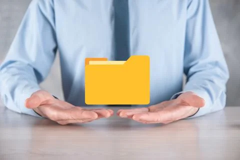 Businessman hold folder icon.Document Management System or DMS setup by IT co 库存照片