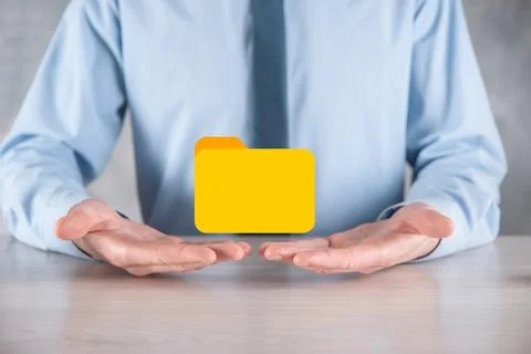 Businessman hold folder icon.Document Management System or DMS setup by IT co 库存照片