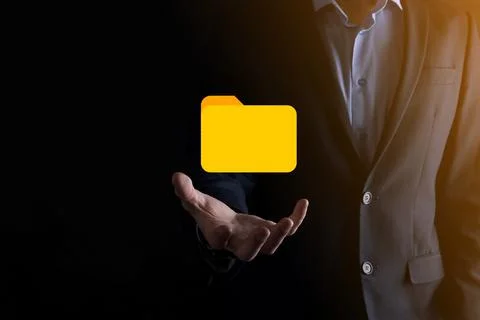 Businessman hold folder icon.Document Management System or DMS setup by IT co 写真素材