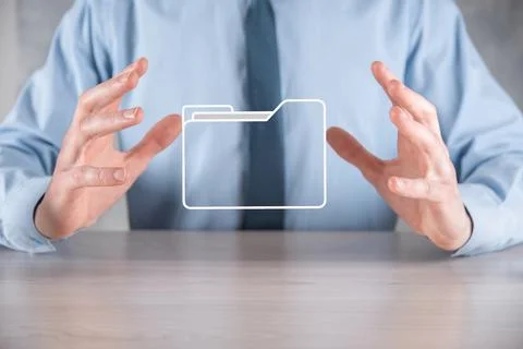 Businessman hold folder icon.Document Management System or DMS setup by IT co 写真素材