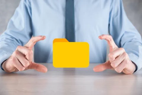 Businessman hold folder icon.Document Management System or DMS setup by IT co 写真素材