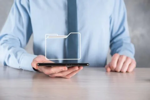 Businessman hold folder icon.Document Management System or DMS setup by IT co 写真素材